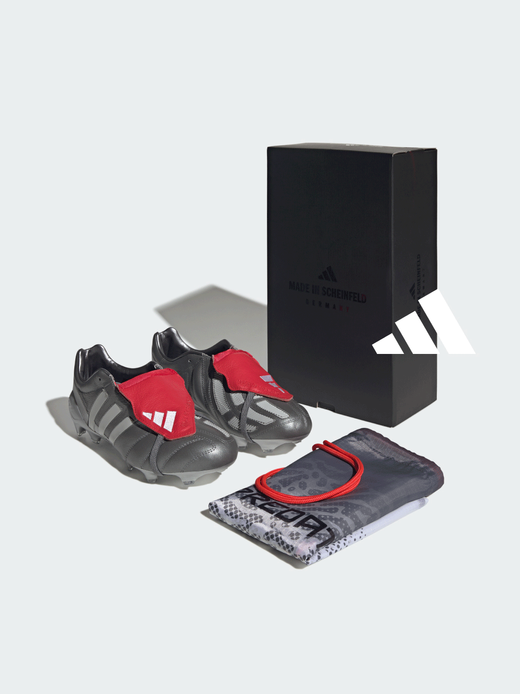 PREDATOR MANIA Firm Ground Football Boots